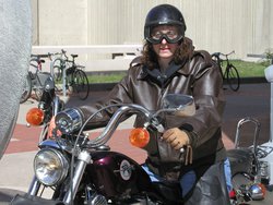 Jennet Kirschenbaum on her hog outside the CIT 2003-0501.Spring.png