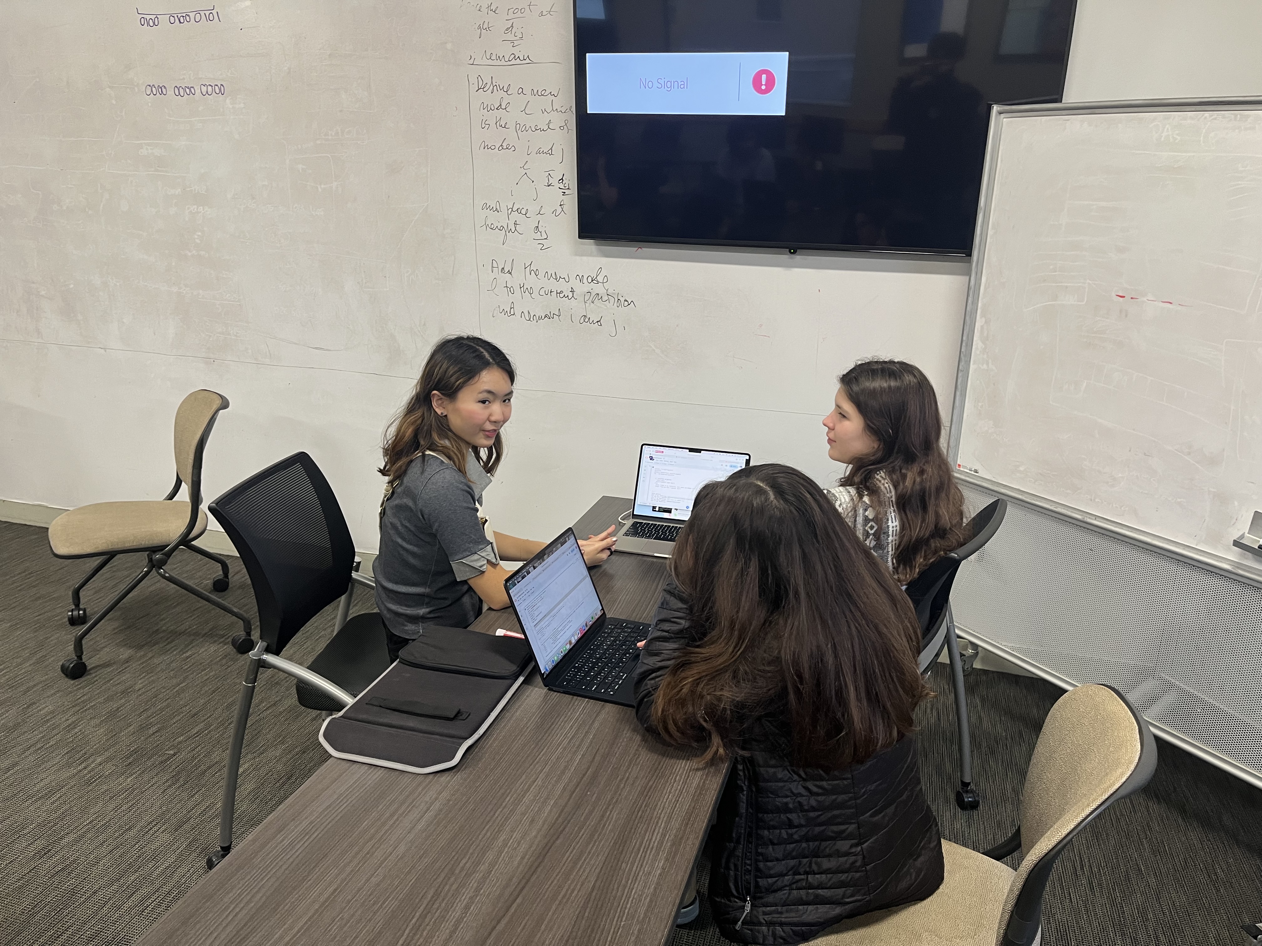 Students coding in Python