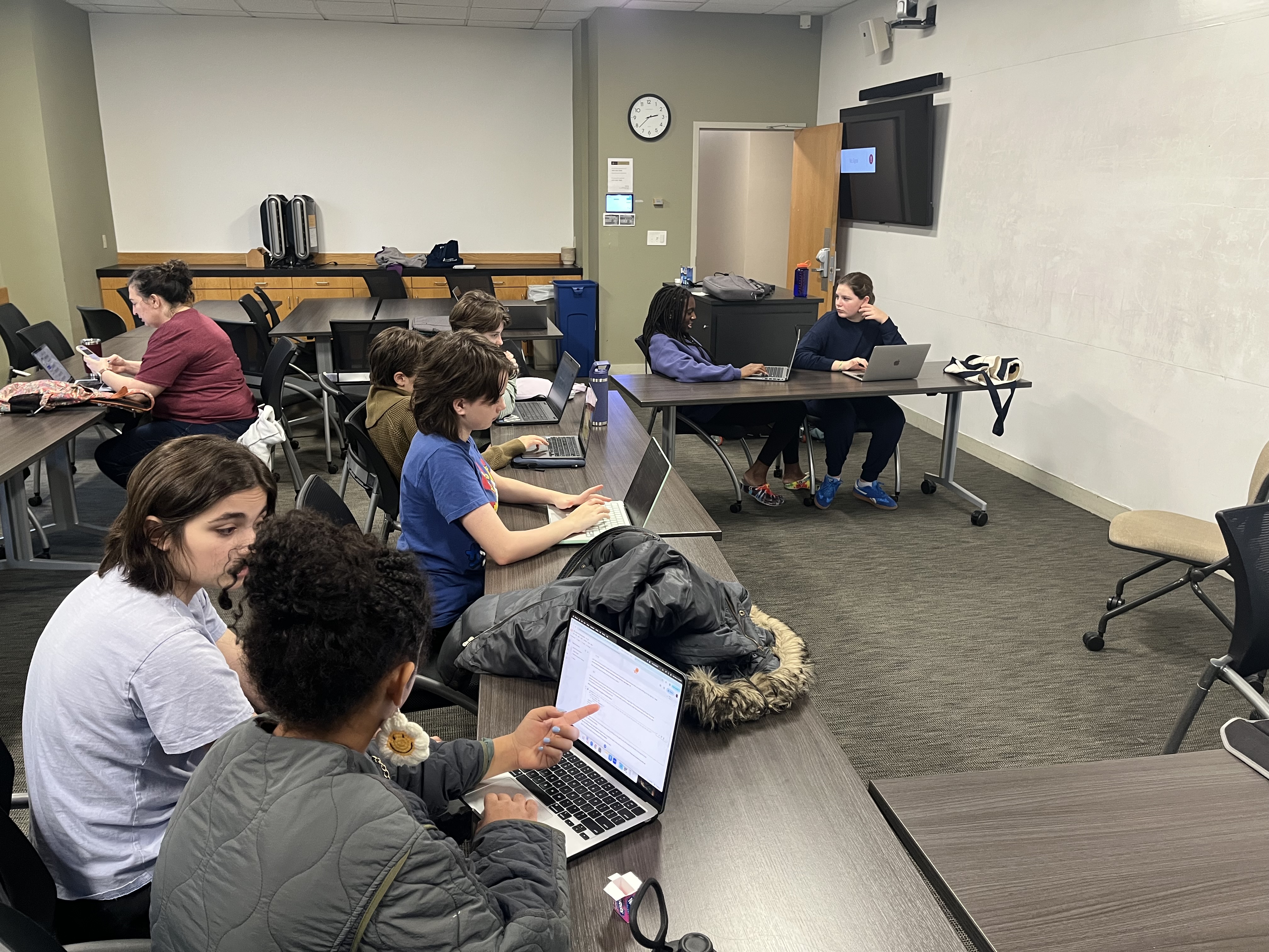 Students coding in Python