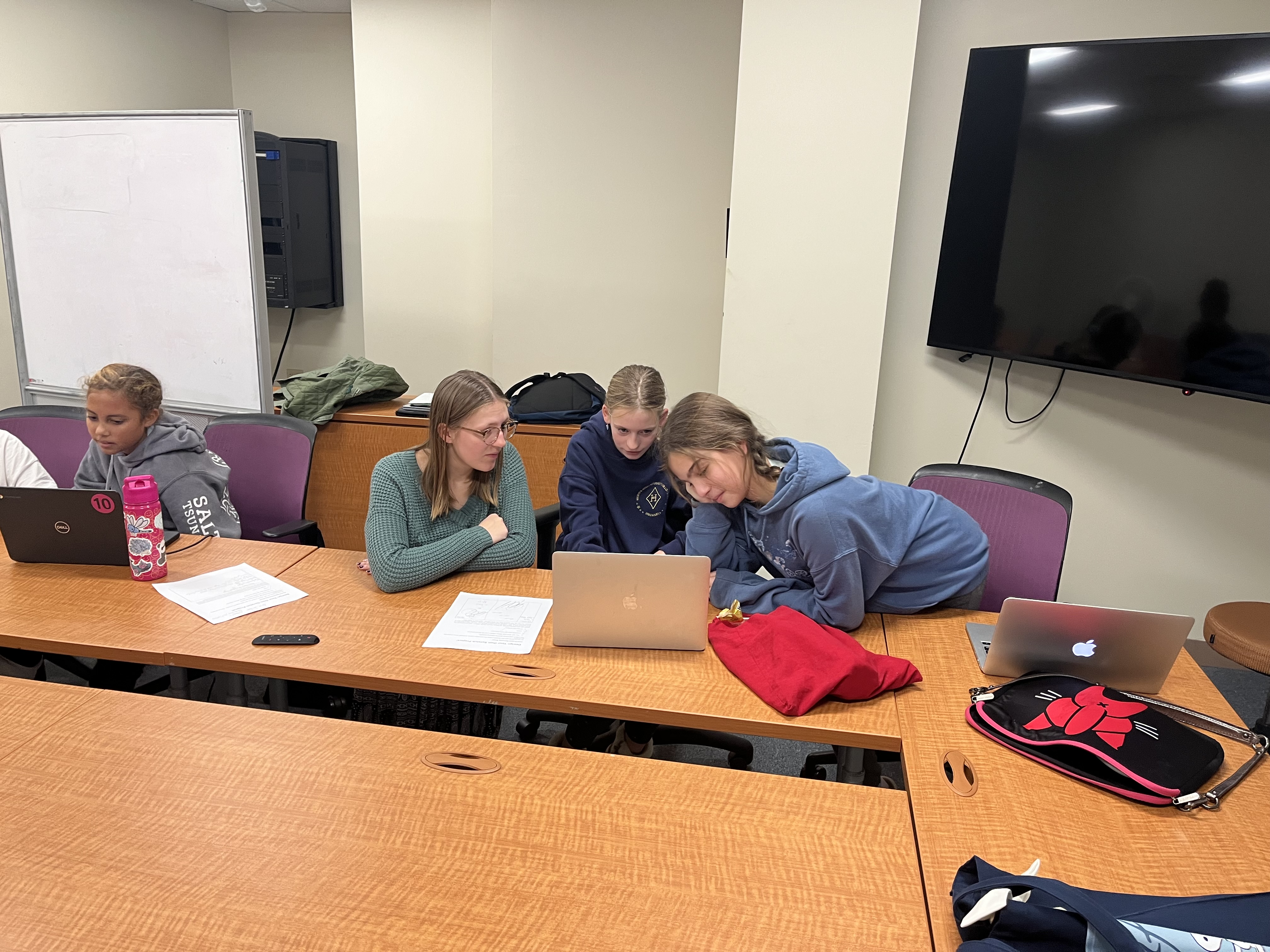 Students coding in Scratch