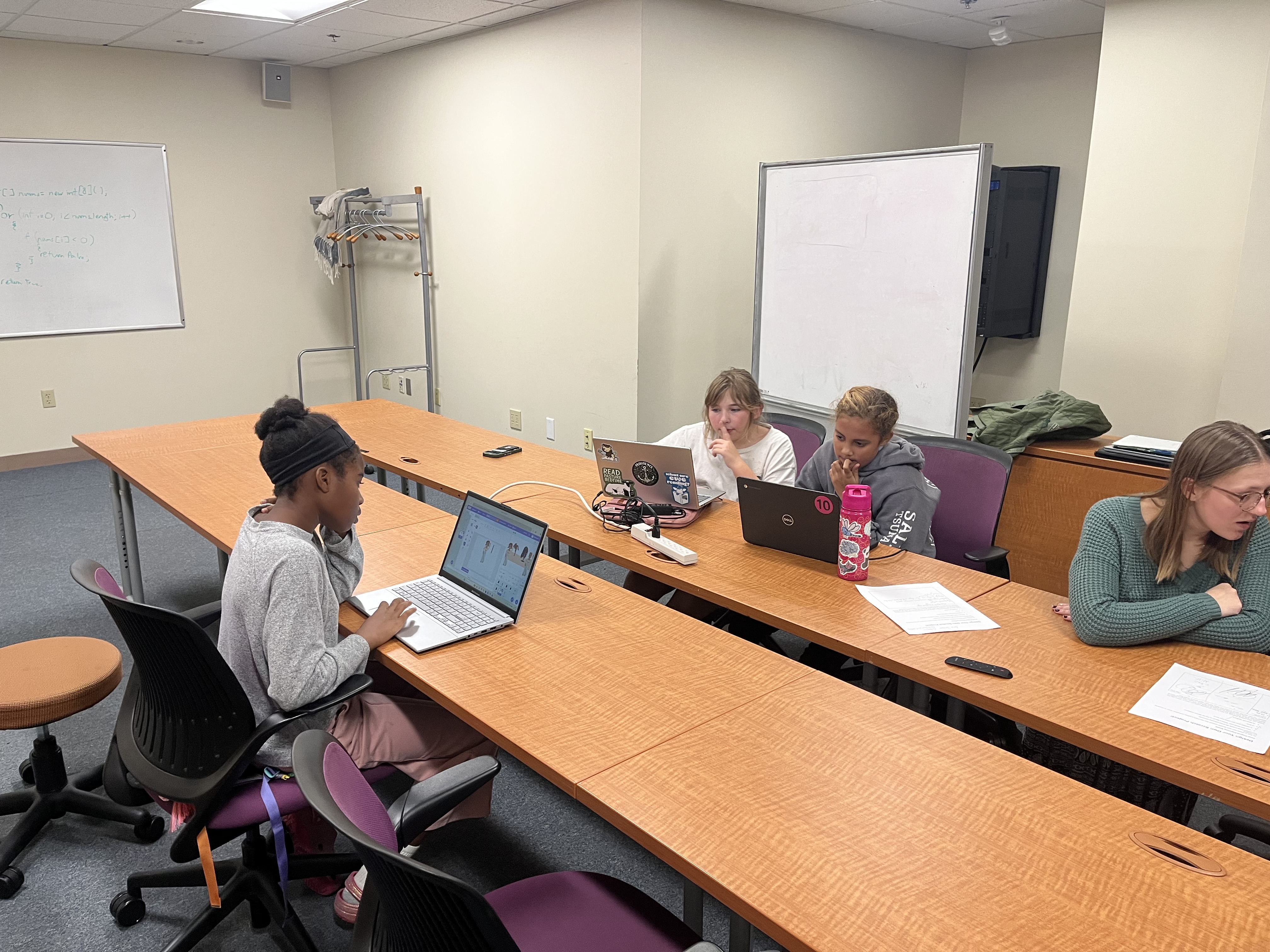 Students coding in Scratch