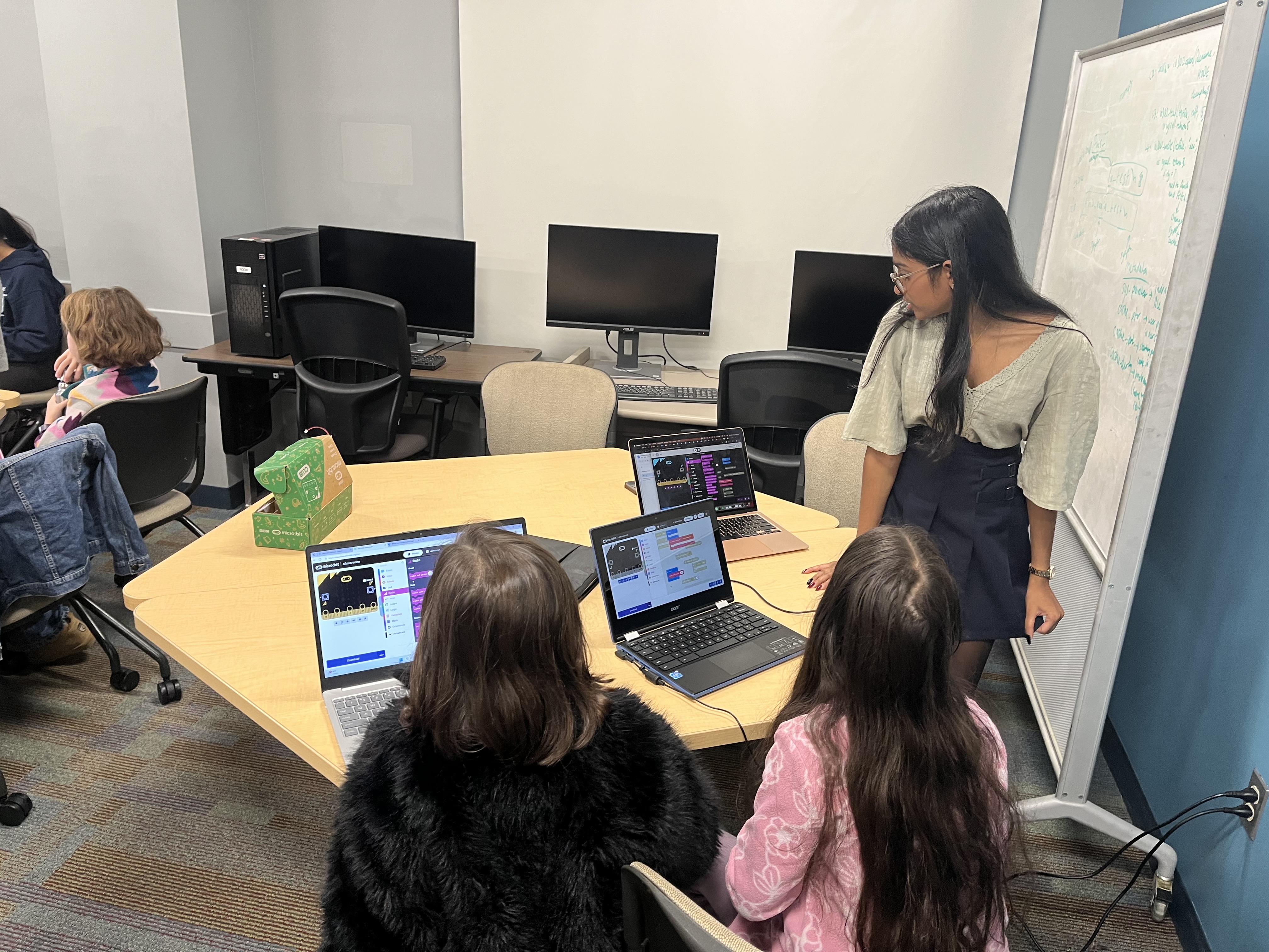 Students working with microbits