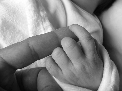 [with father's hand]